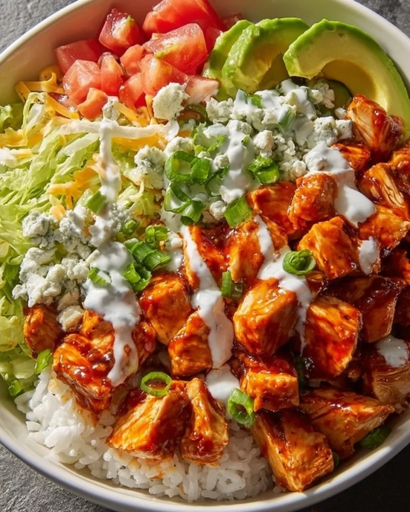Delicious Buffalo Chicken Bowls topped with fresh ingredients
