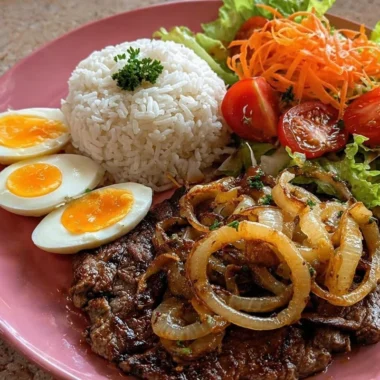 Garlic butter steak served with rice and fresh crunch salad on a plate